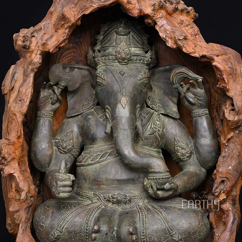 antique ganesha statue, closeup angel