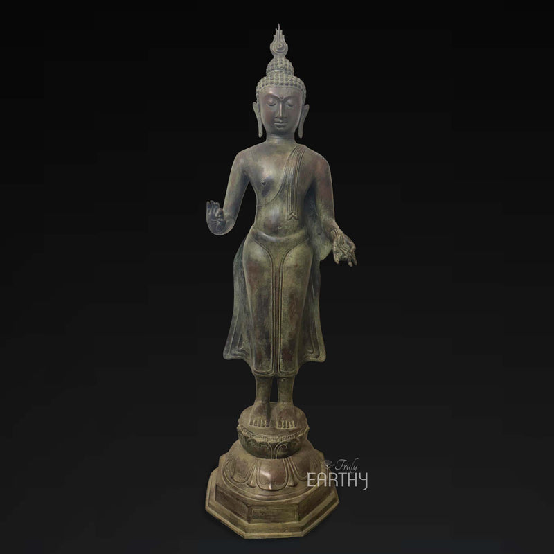 bronze standing buddha